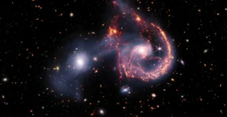 Galactic Collision Observed by James Webb Telescope: A Cosmic Smile 465 Million Light-Years Away